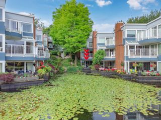 Photo 2: 1581 MARINER Walk in Vancouver: False Creek Townhouse for sale in "The Lagoons" (Vancouver West)  : MLS®# R2789573