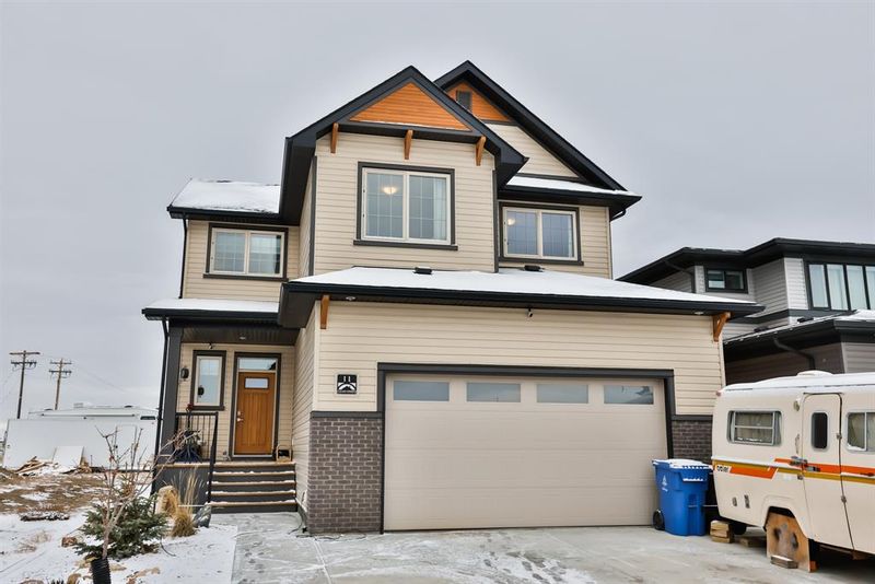 FEATURED LISTING: 11 Canyon Meadows Bend West Lethbridge