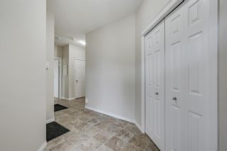 Photo 5: 48 Arbours Circle NW: Langdon Row/Townhouse for sale : MLS®# A1206243