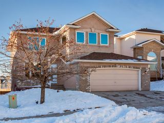 Main Photo: 64 Simcoe Close SW in Calgary: Signal Hill Detached for sale : MLS®# A1058933