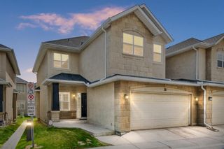 Photo 1: 58 39 Strathlea Common SW in Calgary: Strathcona Park Semi Detached for sale : MLS®# A1223906