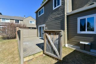 Photo 5: 1301 829 Coach Bluff Crescent in Calgary: Coach Hill Row/Townhouse for sale : MLS®# A1094909