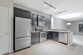 Photo 6: 1713 125 Panatella Way NW in Calgary: Panorama Hills Row/Townhouse for sale : MLS®# A2106214