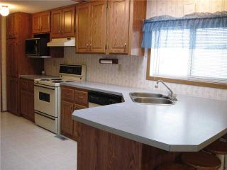 Photo 3: 22 8420 ALASKA Road in Fort St. John: Fort St. John - City SE Manufactured Home for sale in "PEACE COUNTRY MOBILE HOME PARK" (Fort St. John (Zone 60))  : MLS®# N225043