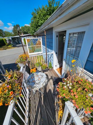 Photo 2: 31 145 KING EDWARD Street in Coquitlam: Maillardville Manufactured Home for sale in "MILL CREEK VILLAGE" : MLS®# R2801413
