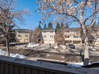 Photo 10: 393 Point Mckay Gardens NW in Calgary: Point McKay Row/Townhouse for sale : MLS®# A2120125