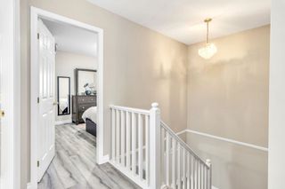Photo 12: 107 13900 HYLAND Road in Surrey: East Newton Townhouse for sale in "Hyland Grove" : MLS®# R2755350
