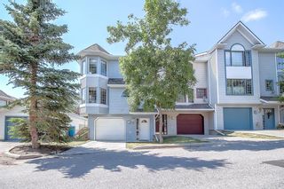 Photo 1: 21 Patina Point SW in Calgary: Patterson Row/Townhouse for sale : MLS®# A1215746