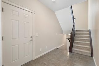 Photo 3: 1109 Wentworth Villas SW in Calgary: West Springs Row/Townhouse for sale : MLS®# A2129861
