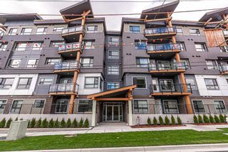 Photo 1: 408 33568 GEORGE FERGUSON WAY in Abbotsford: Central Abbotsford Condo for sale : MLS®# R2563113