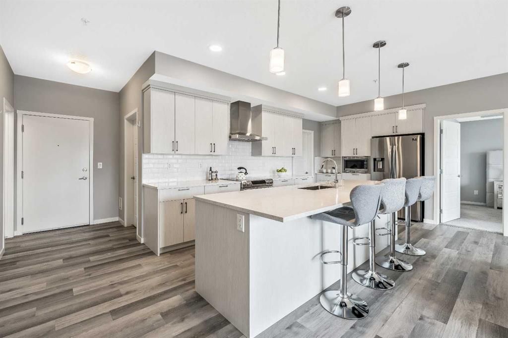 Main Photo: 204 300 Harvest Hills Place NE in Calgary: Harvest Hills Apartment for sale : MLS®# A2074527