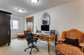 Photo 14: 5 Lewis Mackenzie Place SW in Calgary: Garrison Green Row/Townhouse for sale : MLS®# A2028114