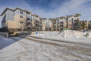Photo 1: 109 108 Country Village Circle NE in Calgary: Country Hills Village Apartment for sale : MLS®# A2030747