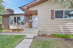 Main Photo: 446 Queensland Place SE in Calgary: Queensland Detached for sale : MLS®# A2136822