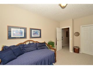 Photo 38: 134 GLENEAGLES View: Cochrane House for sale : MLS®# C4018773