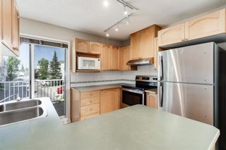 Photo 8: 4104 7171 Coach Hill Road SW in Calgary: Coach Hill Row/Townhouse for sale : MLS®# A2078886
