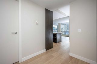 Photo 3: 1015 222 Riverfront Avenue SW in Calgary: Chinatown Apartment for sale : MLS®# A2124351