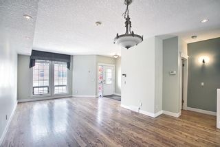 Photo 4: 1715 College Lane SW in Calgary: Lower Mount Royal Row/Townhouse for sale : MLS®# A1134459