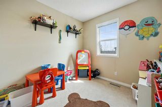 Photo 15: 127 Everhollow Heights SW in Calgary: Evergreen Row/Townhouse for sale : MLS®# A2127215