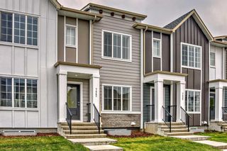 Photo 2: 7443 202 Avenue SE in Calgary: C-390 Row/Townhouse for sale : MLS®# A2077842