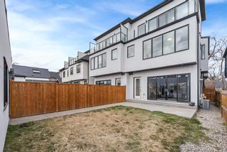 Photo 2: 129 7 Avenue NE in Calgary: Crescent Heights Semi Detached (Half Duplex) for sale : MLS®# A2122641