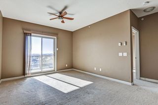 Photo 10: 1407 92 CRYSTAL SHORES Road: Okotoks Apartment for sale : MLS®# A1222250