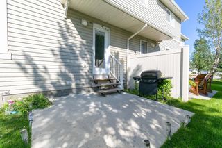 Photo 28: 58 Arbours Circle NW: Langdon Row/Townhouse for sale : MLS®# A1137898