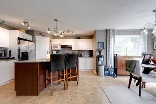 Photo 13: 35 Cougarstone Landing SW in Calgary: Cougar Ridge Detached for sale : MLS®# A2063797