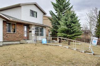 Photo 3: 329 Woodvale Crescent SW in Calgary: Woodlands Semi Detached for sale : MLS®# A1093334