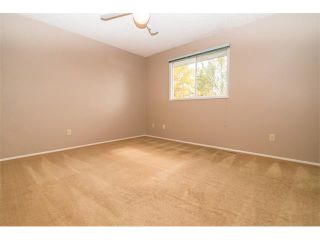 Photo 19: 1240 MEADOWBROOK Drive SE: Airdrie House for sale : MLS®# C4031774