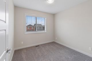 Photo 23: 614 32 Red Embers Parade NE in Calgary: Redstone Row/Townhouse for sale : MLS®# A1220796