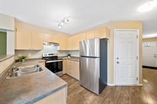 Photo 5: 135 Citadel Meadow Gardens NW in Calgary: Citadel Row/Townhouse for sale : MLS®# A1225391