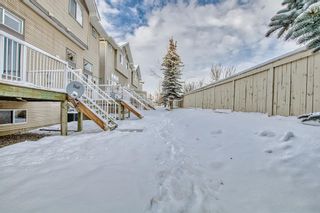 Photo 46: 80 Crystal Shores Cove: Okotoks Row/Townhouse for sale : MLS®# A2016287