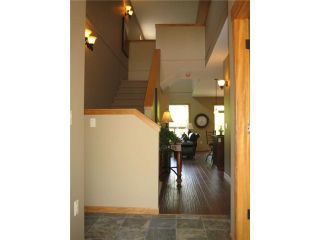 Photo 2: 104 24185 106B Avenue in Maple Ridge: Albion 1/2 Duplex for sale in "TRAILS EDGE" : MLS®# V1000386