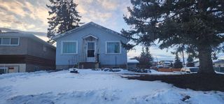 Photo 1: 903 39 Street SE in Calgary: Forest Lawn Detached for sale : MLS®# A2103999