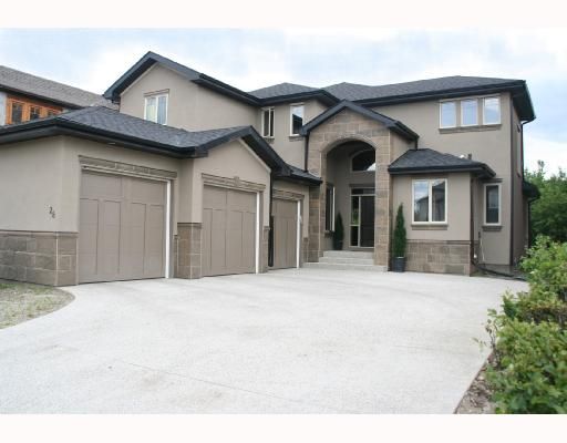 Fabulous Curb Appeal!  Backing onto private green space!