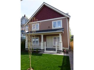 Photo 1: 2051 E 1ST Avenue in Vancouver: Grandview VE 1/2 Duplex for sale (Vancouver East)  : MLS®# V1078042