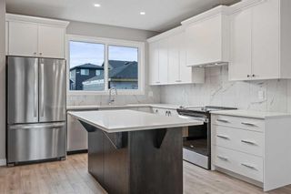 Photo 7: 84 Belmont Green SW in Calgary: Belmont Detached for sale : MLS®# A2095377