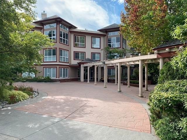 Main Photo: 110 15342 20 Avenue in Surrey: King George Corridor Condo for sale in "Sterling Place" (South Surrey White Rock)  : MLS®# R2617836