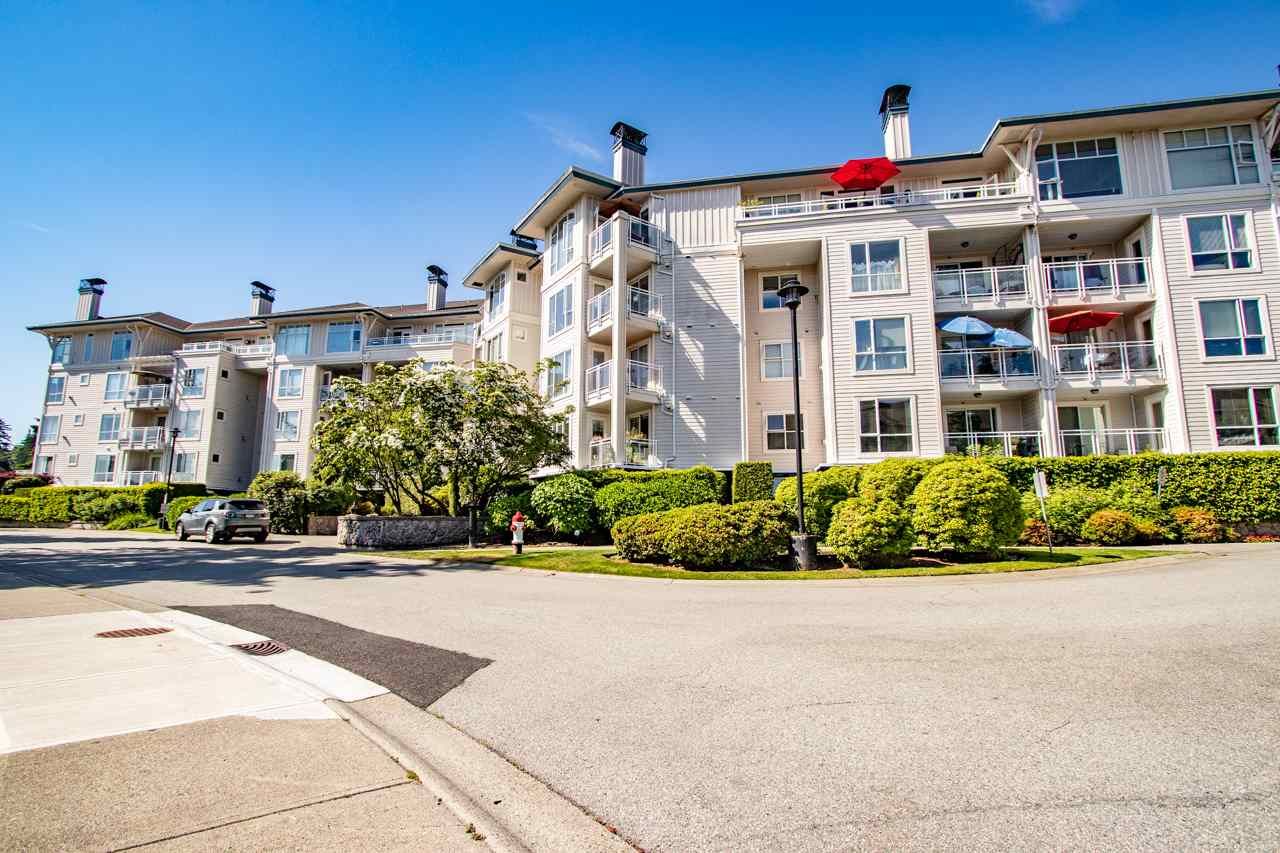 Main Photo: 218 3608 DEERCREST Drive in North Vancouver: Roche Point Condo for sale in "DEERFIELD AT RAVENWOODS" : MLS®# R2418944