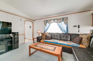 Photo 4: 103 Glasgow Street: Blackie Mobile for sale : MLS®# A2122498
