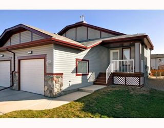 Photo 2: 579 STONEGATE Way NW: Airdrie Residential Attached for sale : MLS®# C3397152