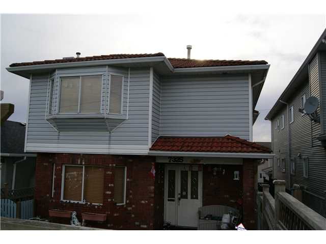 Main Photo: 7327 FRASER Street in Vancouver: South Vancouver 1/2 Duplex for sale (Vancouver East)  : MLS®# V843279