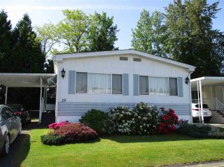 Photo 1: 25 13507 81 Avenue in Surrey: Queen Mary Park Surrey Manufactured Home for sale in "Park Boulevard Estates" : MLS®# R2583115