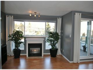 Photo 5: 205 6390 196TH Street in Langley: Willoughby Heights Condo for sale in "WillowGate" : MLS®# F1402984