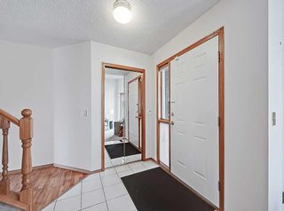 Photo 3: 128 Edgebank Circle NW in Calgary: Edgemont Detached for sale : MLS®# A2129474