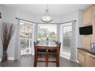 Photo 8: 224 SUNTERRA RIDGE Place: Cochrane Residential Detached Single Family for sale : MLS®# C3633482