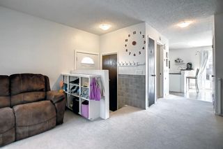 Photo 6: 102 Ranchero Rise NW in Calgary: Ranchlands Semi Detached for sale : MLS®# A1210839
