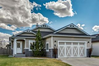Photo 1: 717 Stonehaven Drive: Carstairs Detached for sale : MLS®# A1105232