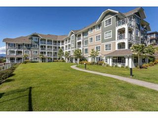 Photo 2: 104 16398 64 Avenue in Surrey: Cloverdale BC Condo for sale in "The Ridge at Bose Farm" (Cloverdale)  : MLS®# R2590975